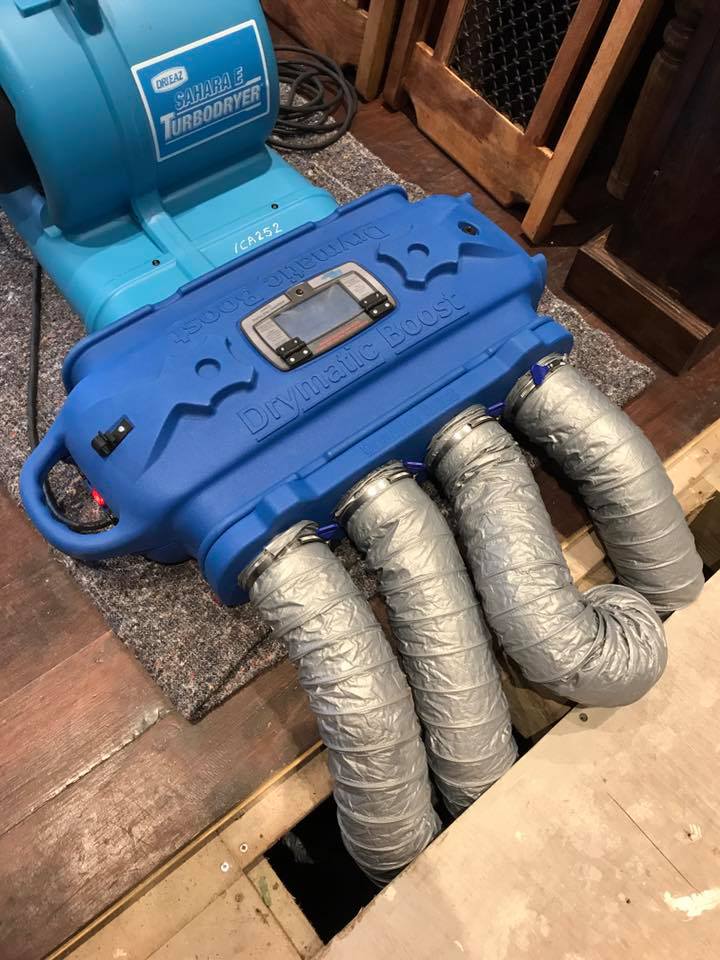 DBK DRYMATIC - Floor & Wall Heat Drying System, #FGPH109, Boost Bar with 4 larger hoses hooked up drying a subfloor area