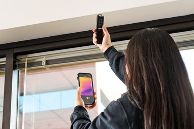 flir one edge pro being used to check above window