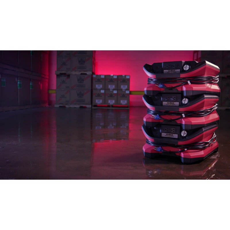  view of 3 units of Phoenix AirMAX BLE Bluetooth Enabled Low Profile Radial Air Mover in red in warehouse area