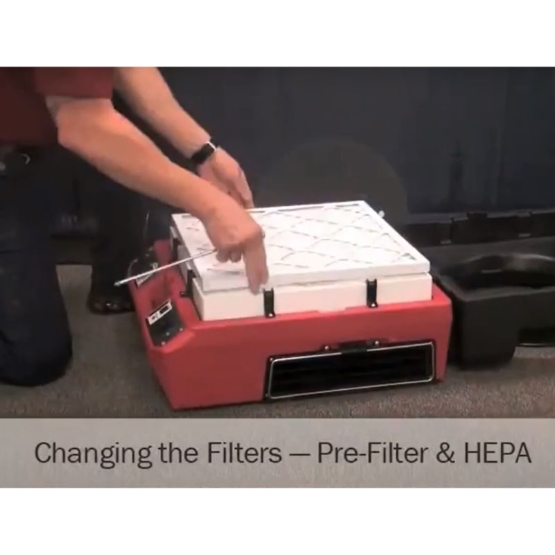 phoenix guardian r hepa air scrubber in red showing the pre filter and hepa filter being changed