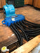 DBK DRYMATIC - Floor & Wall Heat Drying System, #FGPH109, Boost Bar with 12 black drying hoses hooked up drying a subfloor area