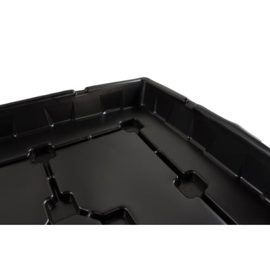 close up view of black dehumidifier drip tray on white background