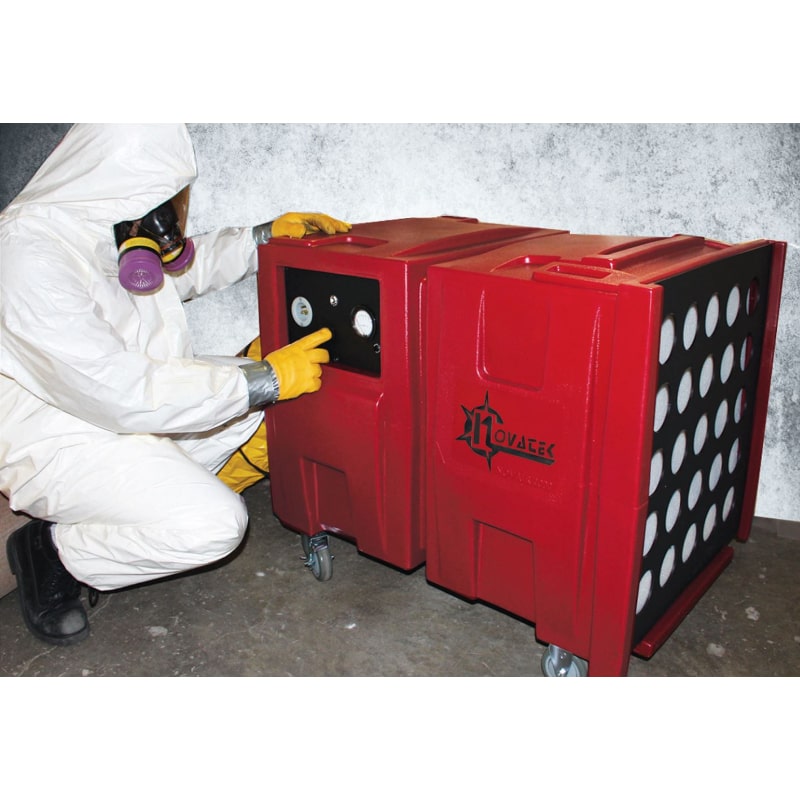 novatek novair 2000 view of worker dressed in ppe using the control panel