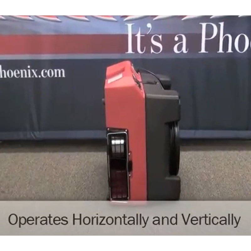 phoenix guardian r hepa air scrubber in red view of it being used vertically