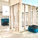 view of xpower x 2580 professional 4 stage hepa mini air scrubber in blue during a restoration project