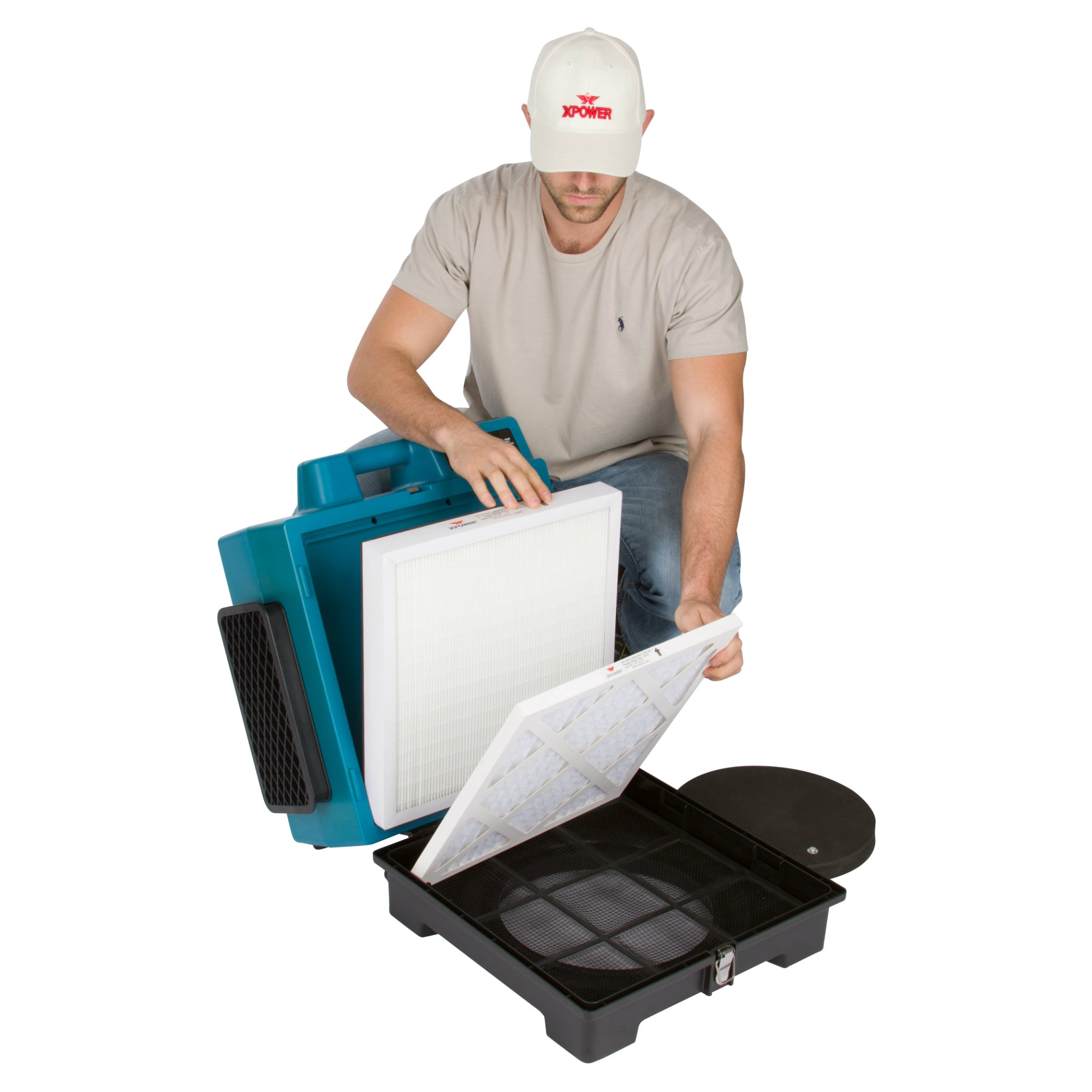 man changing filters on XPOWER X-3400A Professional 3-Stage HEPA Air Scrubber - 600 CFM